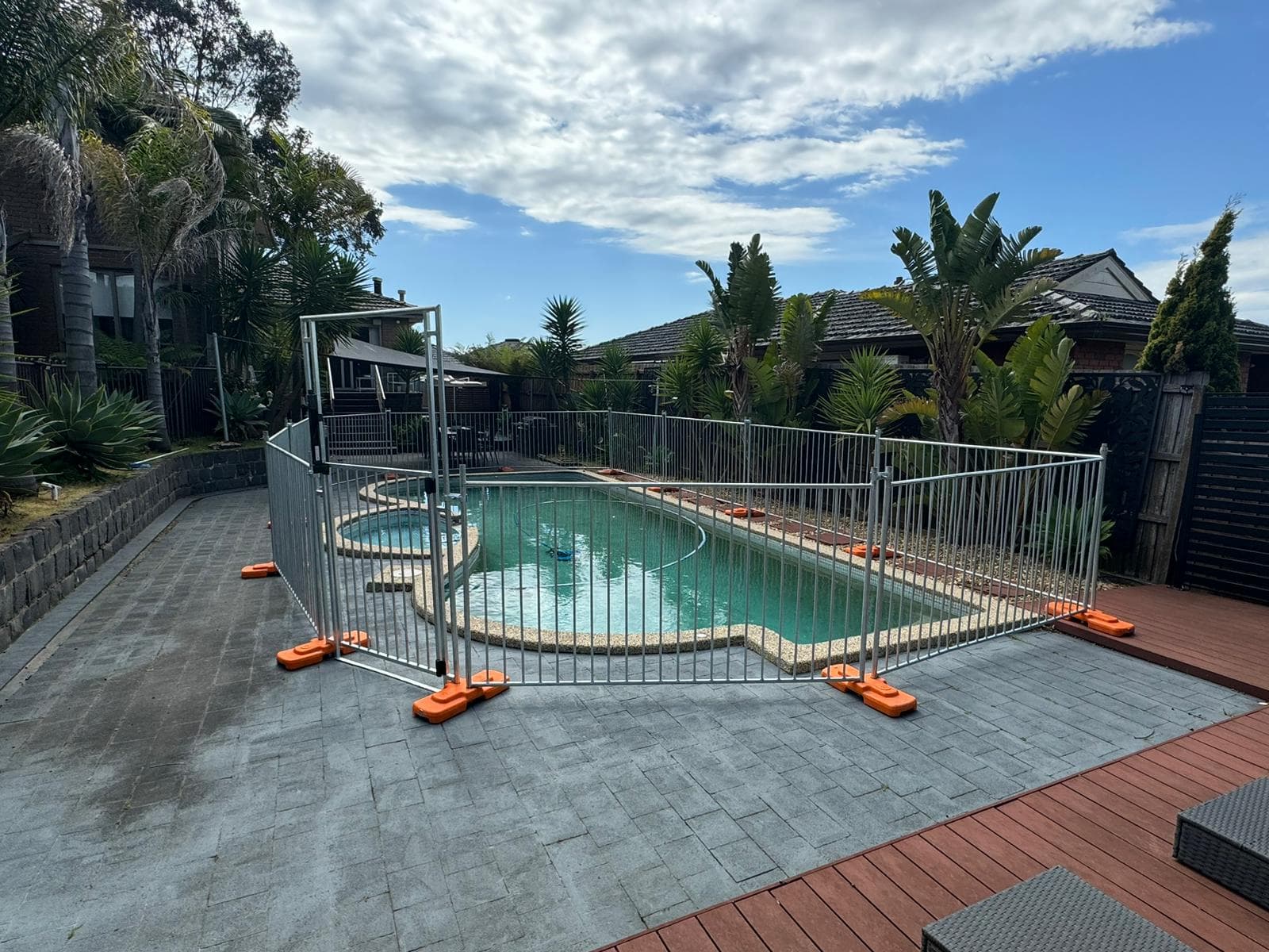 Temporary fencing around an outside pool